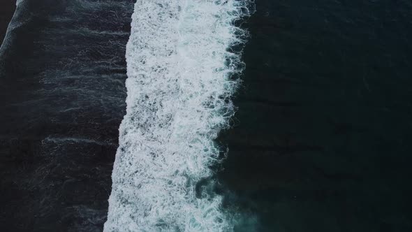 Oceanic Waves on Black Beach Aerial View alt