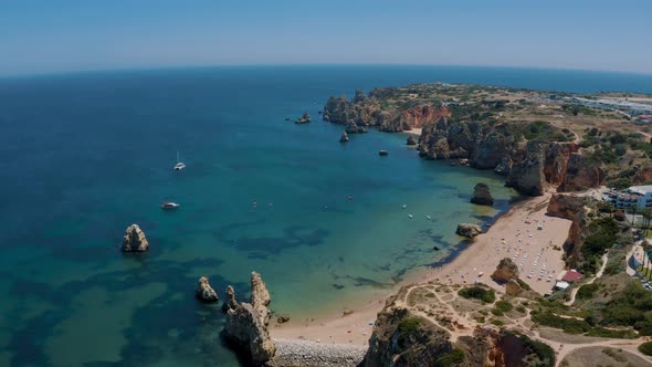 Drone footage of the sea cliff at Ponta Da Piedade in Algarve, Portugal 4K