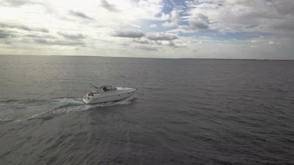 Motorboats On The Water Drone Flying Against Boat Wide Shot