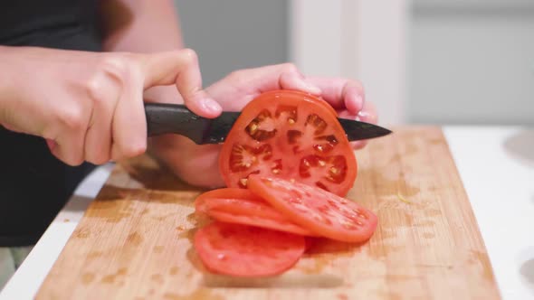 Chopping a Red Tomato