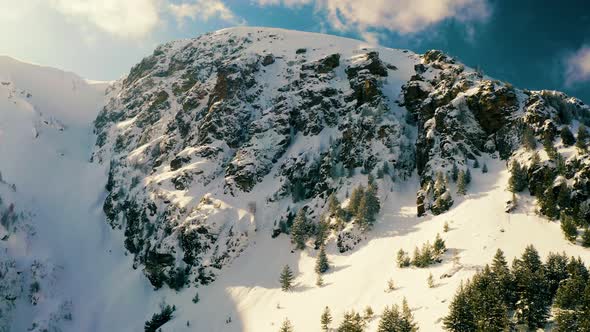Flying Over Snowy Winter Mountains alt