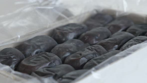 Phoenix dactylifera fruit close-up 4K 2160p 30fps UltraHD tilting  footage - Fresh date palm in open alt