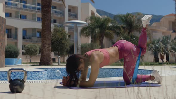 Sexy Woman Butt Workout with Elastic Band alt