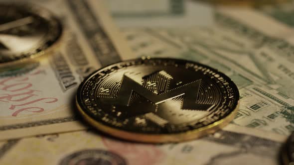 Rotating shot of Bitcoins (digital cryptocurrency) - BITCOIN MONERO  alt