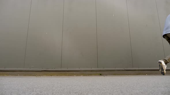 Busy Father Responding the Message on the Phone While Pushing Shopping Cart with Kid. Father Keeping alt