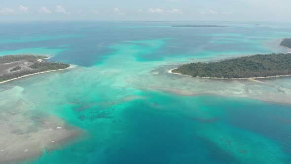 Aerial: flying over desert beach white beach tropical caribbean sea alt