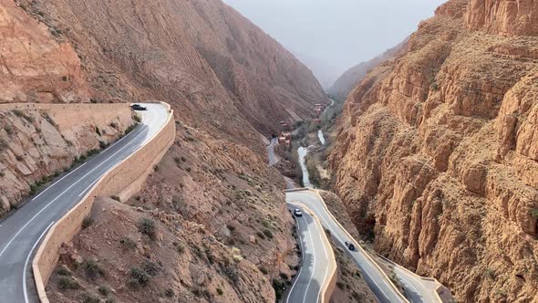 View of Mountain Dangerous Serpentine Road Driving in Canyon in Morocco alt