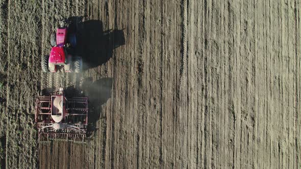 Tractor in Conjunction with a Sowing Unit alt