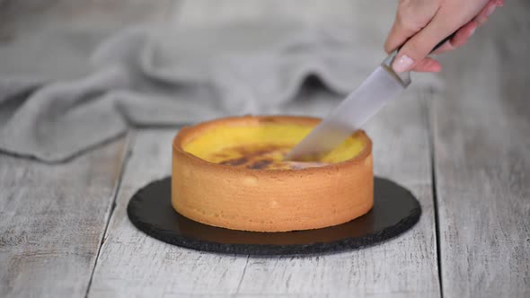 Cutting French Flan Patissier with Kitchen Knife