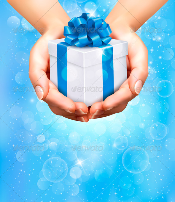 Holiday Background with Hands Holding Gift Box - Christmas Seasons/Holidays