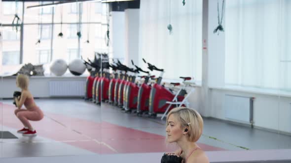 Young woman training in a sports club