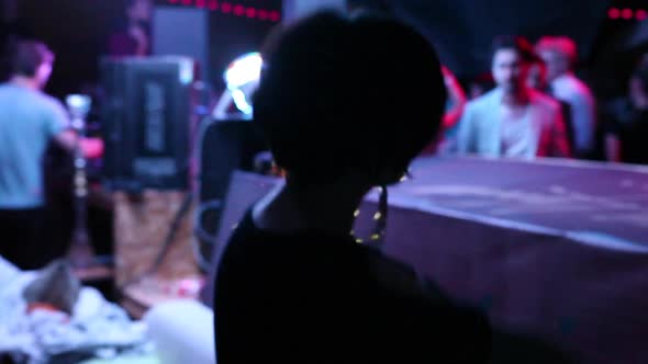 Girl Dancing in a Nightclub