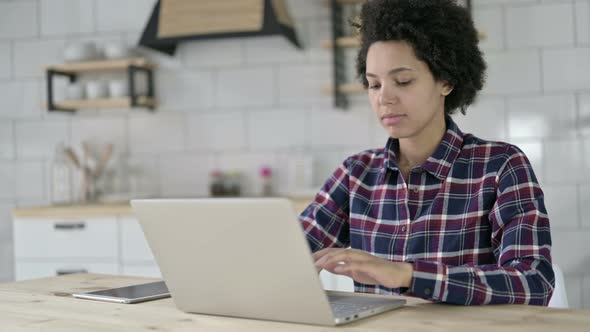 African American Woman Having Back Pain in Office alt