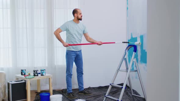 Handyman Renovating House alt