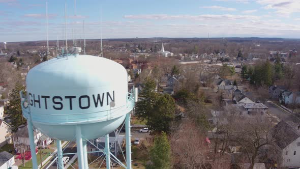 Aerial Drone Shot Flying Past Water Tower in Suburban Hightstown New Jersey