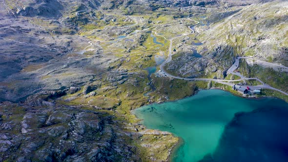 Scenic road in a Beautiful Valley with stunning views and lake, Aerial alt