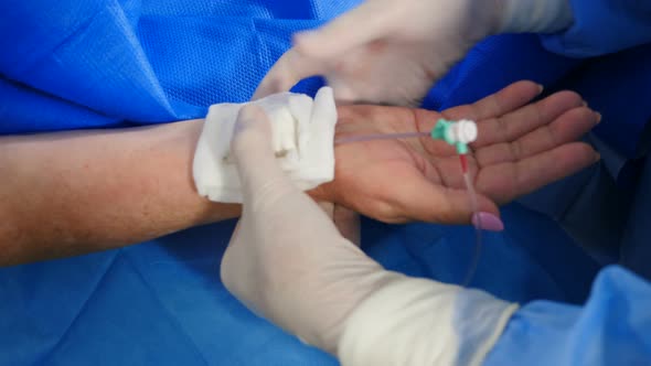 Patient in Hospital Has Central Puncture with Catheter alt