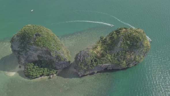 Aerial view of limestone rocks in sea, Phra Nang beach, Krabi Province, coastline Phuket, Thailand. alt