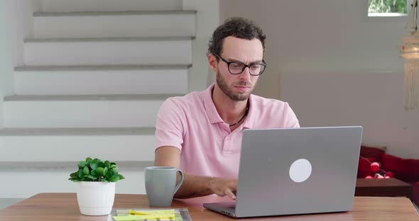 Handsome Successful Young Caucasian Man Wearing a Light Pink Polo Shirt Freelance Worker Experienced alt