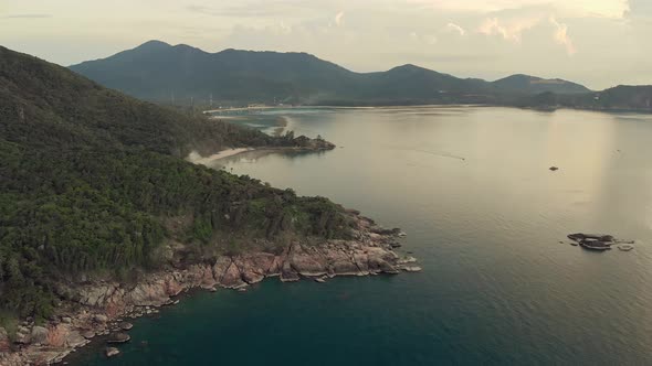 Aerial View on Phangan Island Rocky Coastline  alt