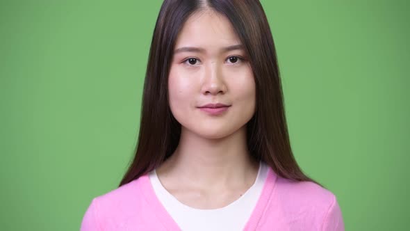 Young Happy Beautiful Asian Woman Smiling