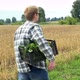 Farmer Walking Along Farmland Holding Crate with Vegetables - VideoHive Item for Sale