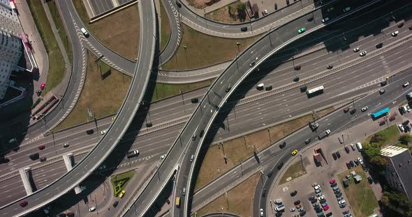 Aerial drone view of highway multi-level junction road with moving cars ...