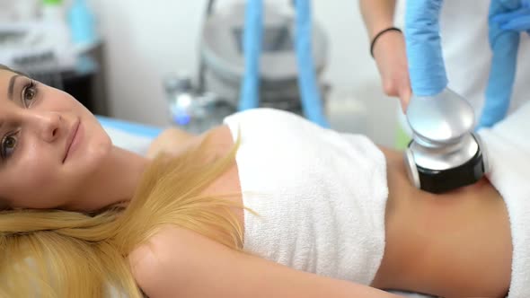 Beautiful Woman Getting Cavitation Treatment alt
