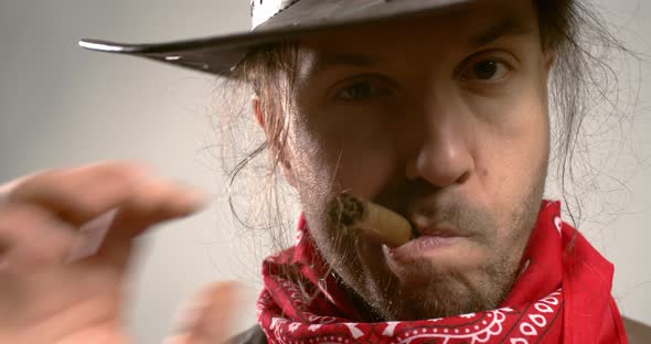 Portrait of a brutal western cowboy with a cigar in his mouth, 4k alt