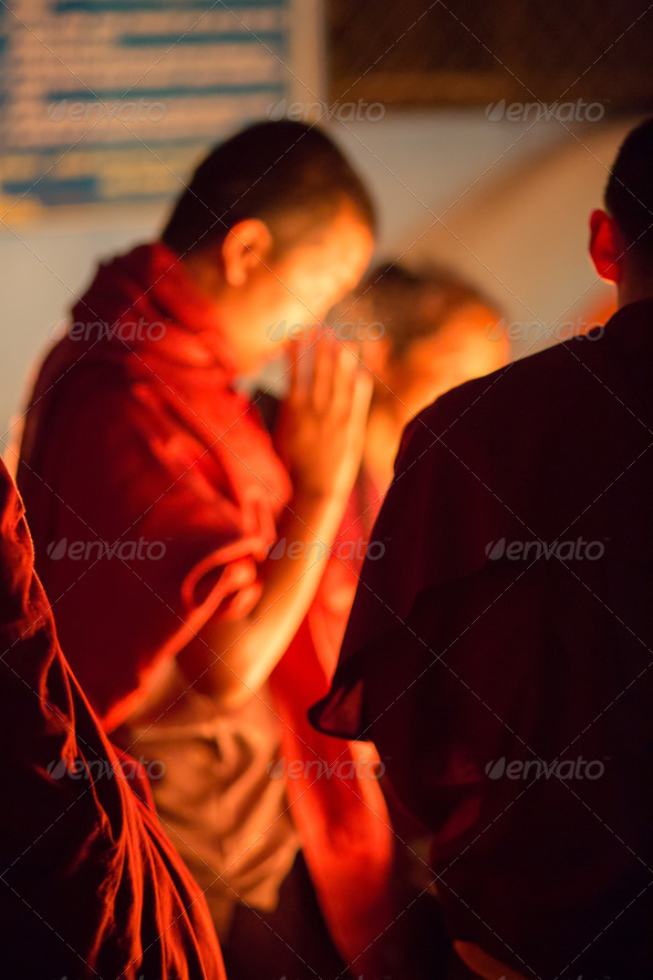 Group of monks praying in Kathmandu - Stock Photo - Images