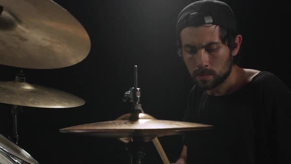 Rock Band Concert Drummer Performing on Drum Kit Slow Motion alt