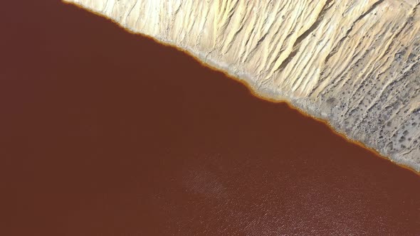 Pit with acid and metalliferous drainage 4K aerial video alt