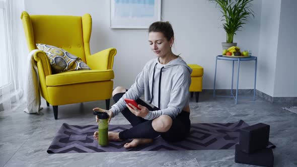 Sportive Woman Relax After Training on Floor