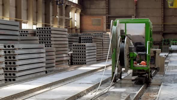 Concrete blocks in factory. Production process of concrete blocks alt