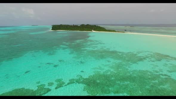 Aerial drone view nature of exotic bay beach break by aqua blue ocean with white sandy background of alt