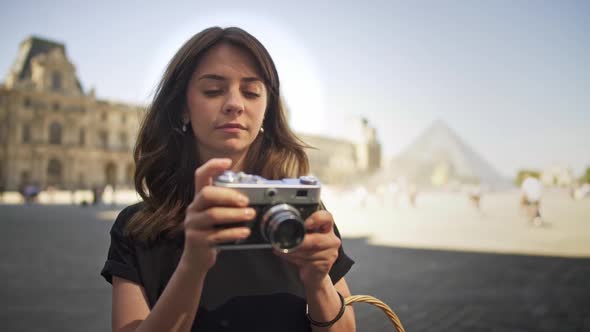 Young Woman Is Tacking Photos in Paris