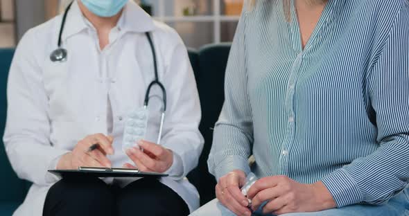 Medical Worker and Patient  Discussing Treatment After that How Doctor Giving Pills alt