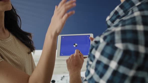 Tracking video of couple discussing how to arrange the apartment. Shot with RED helium camera in 8K alt