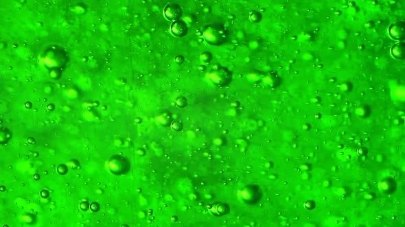 Bubbles in a Vivid Green Gel