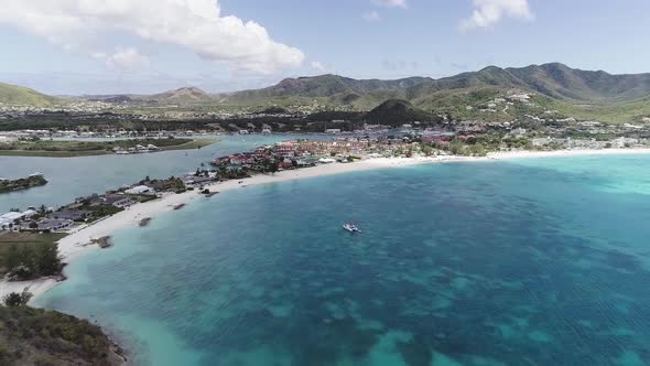 Aerial Drone Footage of Exotic Turquoise Caribbean Ocean Town on the Beach
