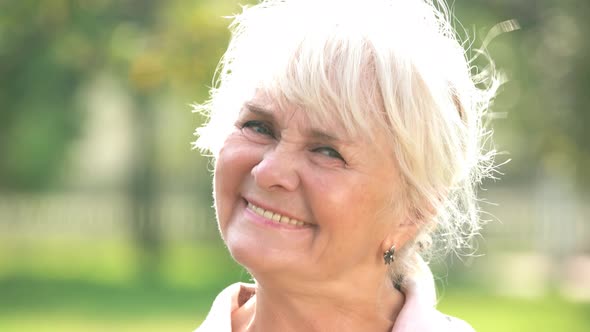 Happy Woman Raising Fists. alt