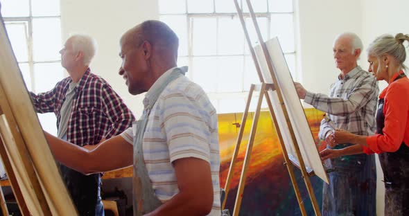 Artist drawing on canvas alt