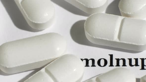 White Pills on White Background with Black Text alt