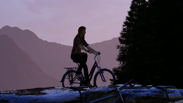 Young Woman Doing Mountain Tour by Bicycle