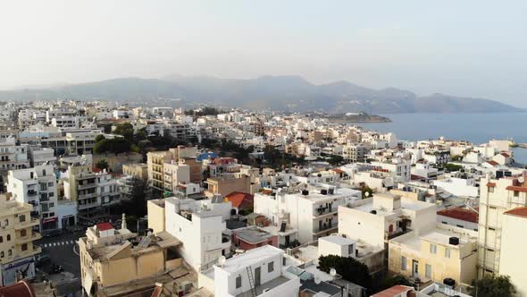 Aerial View of City Agios Nikolaos on a Cloudy Day alt