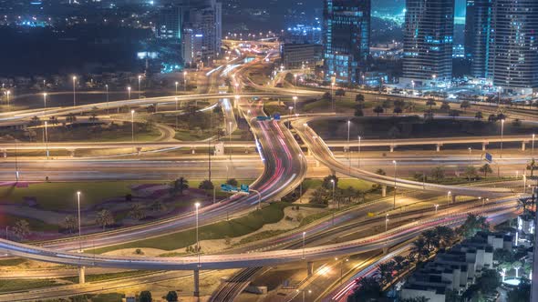 Aerial View of a Road Intersection in a Big City Night Timelapse alt