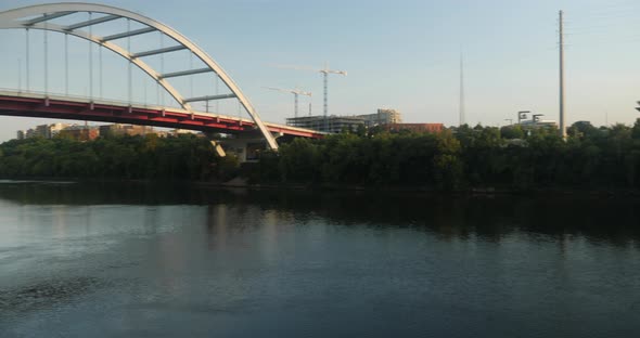 Nashville skyline by the Cumberland River at sunset alt