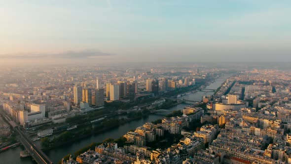 Establishing Aerial View of Paris Cityscape with Seine River
