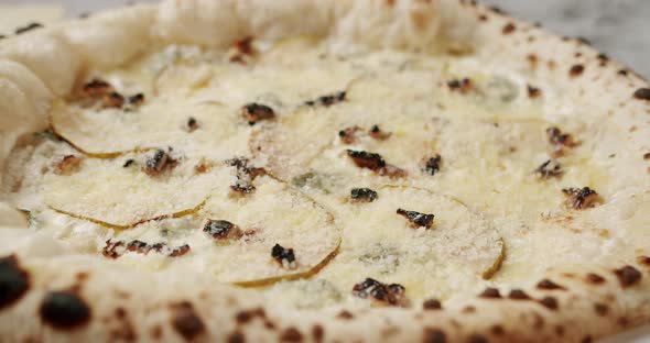 Fresh Out of the Oven Four Cheese Pizza Ready for Eating alt