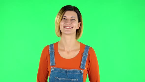 Female Bursting with Laughter Being in Positive. Green Screen alt